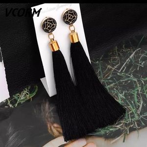 Black tassel earrings with rose emblem